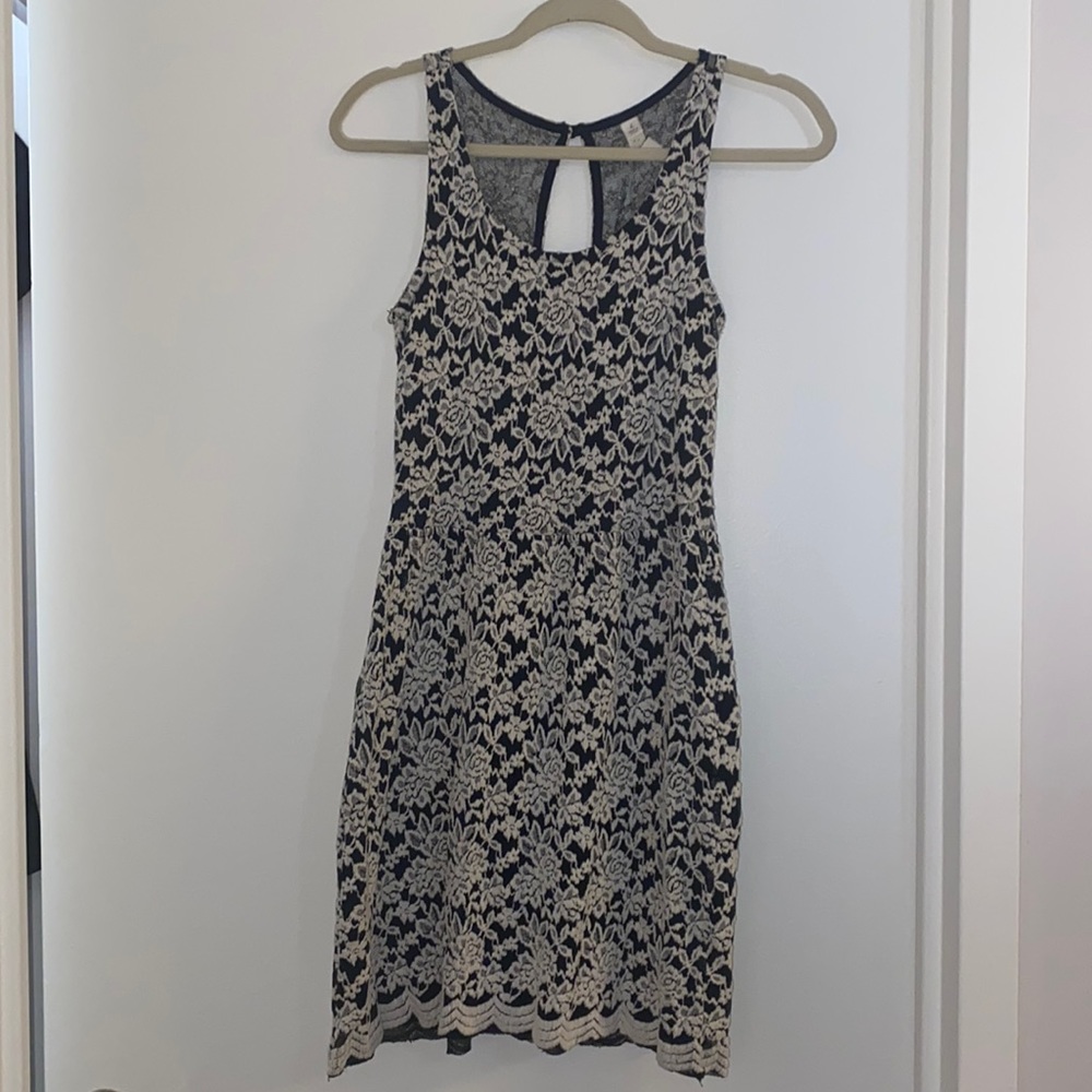 Flared dress with detailed floral stitching